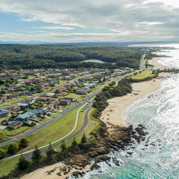 Explore the scenic beauty of Dalmeny, NSW with this stunning aerial view of its coastal landscape.